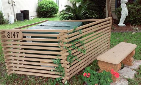 decorative fencing to hide an electrical box|landscaping to hide utility box.